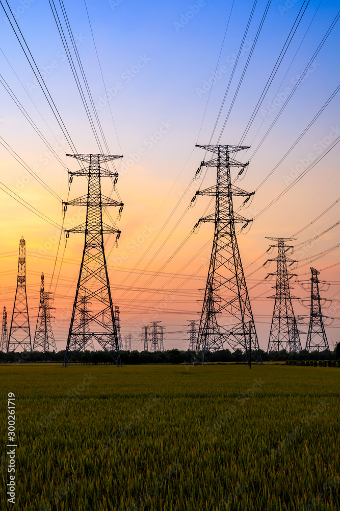 Electricity tower silhouette and sky landscape at dusk Electricity tower silhouette and sky landscape at dusk