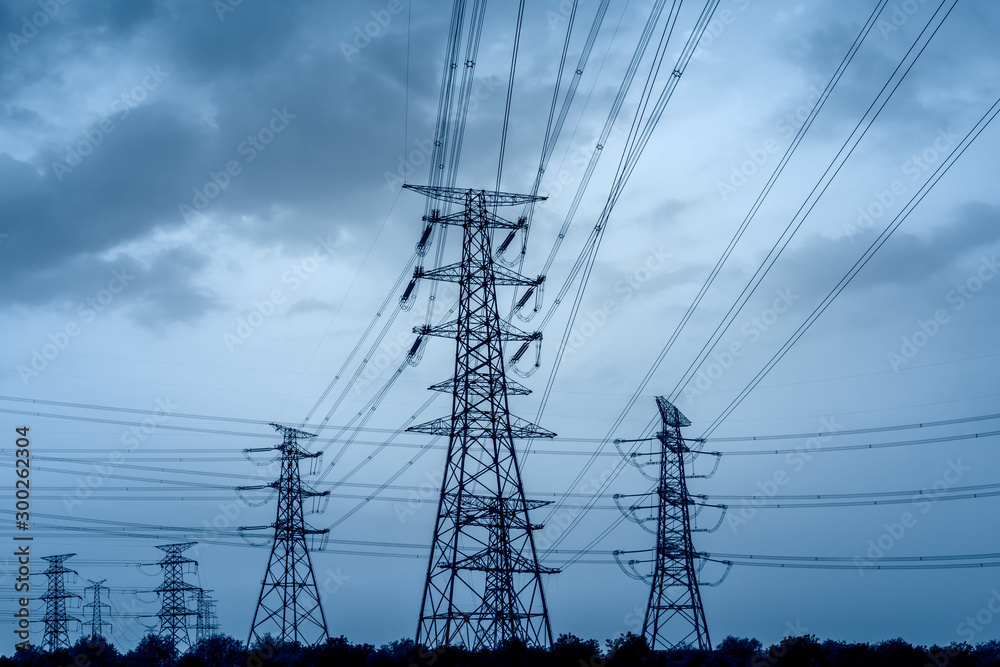 Electricity tower silhouette and sky landscape at dusk Electricity tower silhouette and sky landscape at dusk