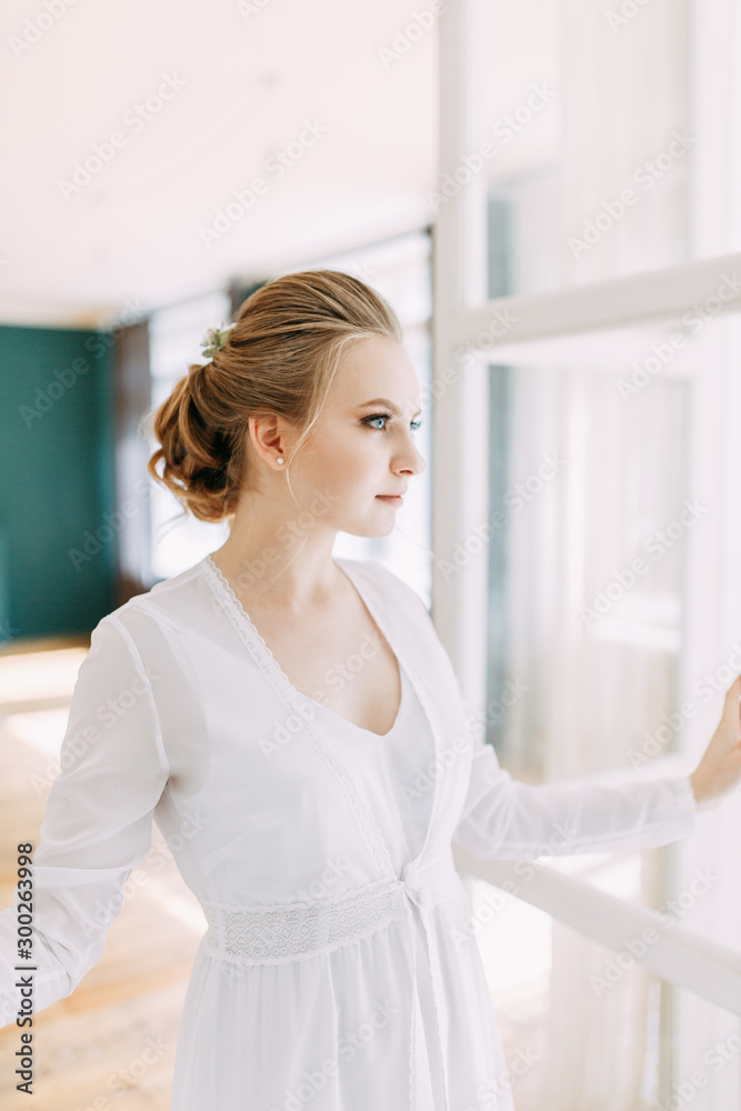 Girl in boudoir dress in European style. Morning bride in the interior Studio. Girl in boudoir dress in European style. Morning bride in the interior Studio.