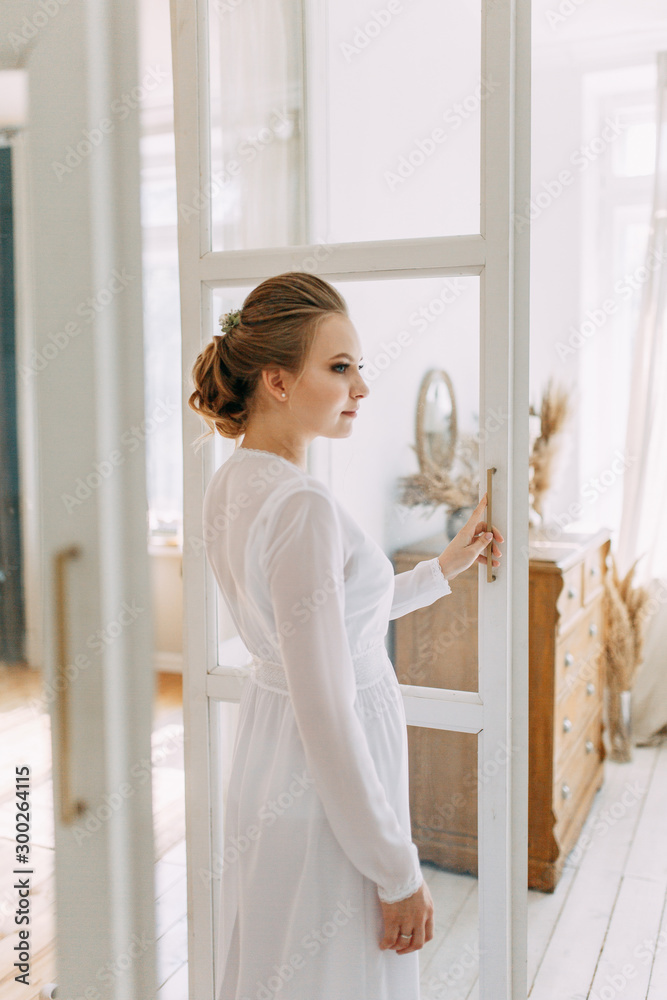 Girl in boudoir dress in European style. Morning bride in the interior Studio. Girl in boudoir dress in European style. Morning bride in the interior Studio.