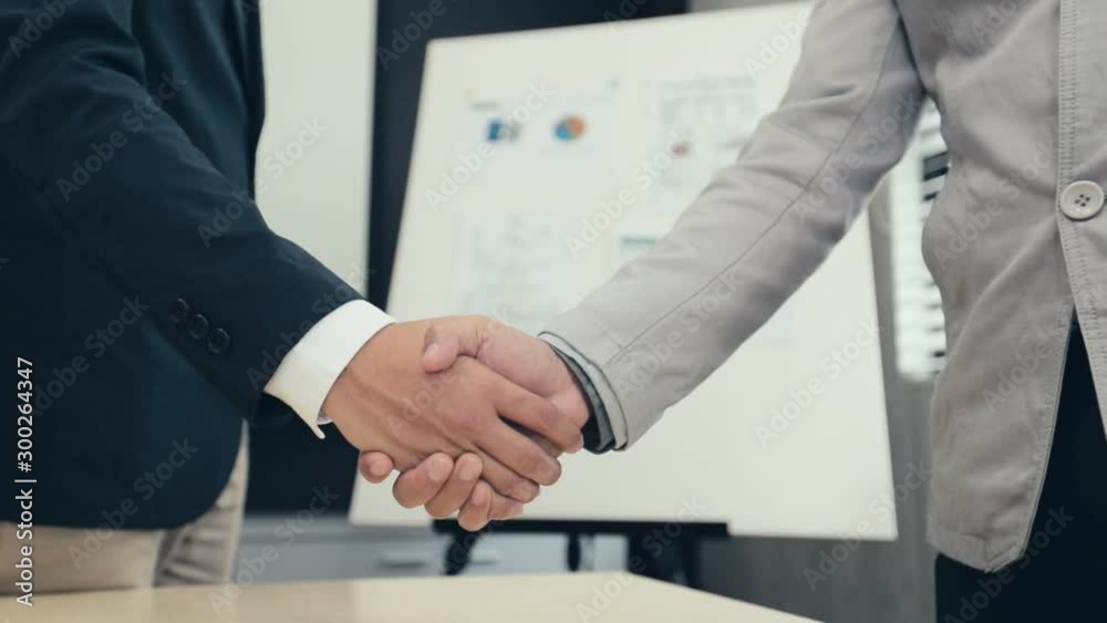 Scene slow motion of Businessman handshake in the office, Finalizing the Deal and Concluding Contract with a Handshake Scene slow motion of Businessman handshake in the office, Finalizing the Deal and Concluding Contract with a Handshake