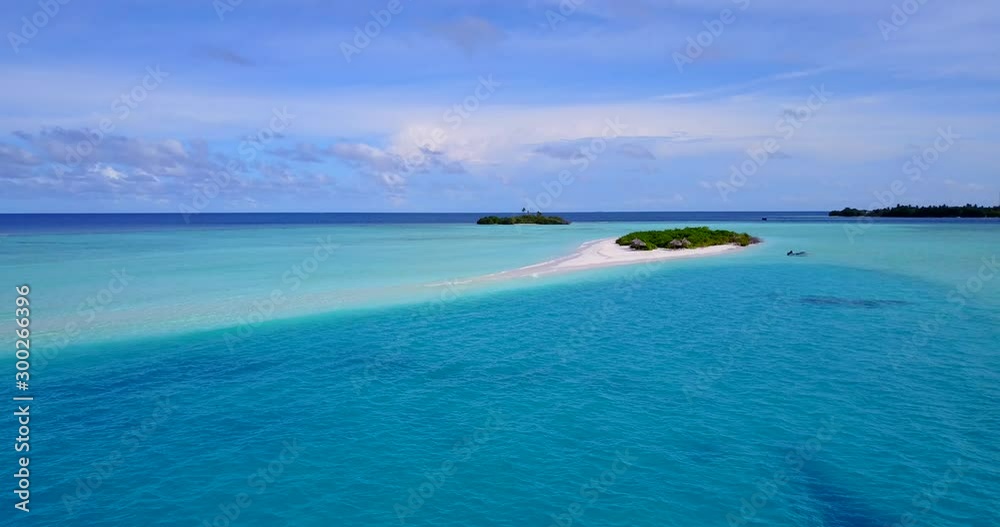 Remote small islands on beautiful seascape, far away from cities of civilized world, perfect vacation location in Maldives Remote small islands on beautiful seascape, far away from cities of civilized world, perfect vacation location in Maldives