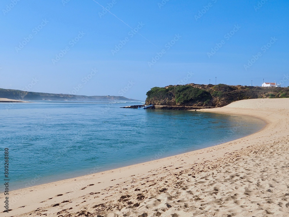 River Mira with beach in Vila Nova de Milfontes in Portugal at river Mira