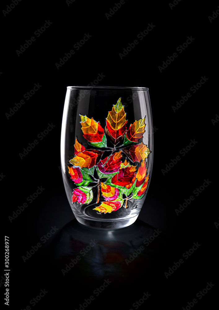 Hand painted glass vase. The background is black. Isolated. Hand painted glass vase. The background is black. Isolated.