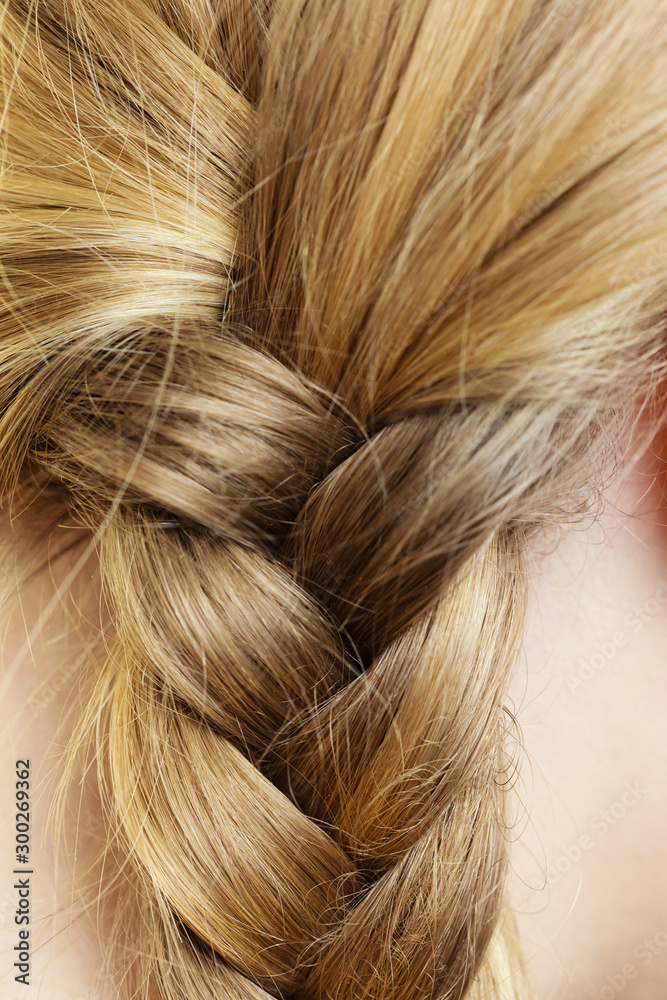 Close up of woman blonde braid hair hairstyle Close up of woman blonde braid hair hairstyle