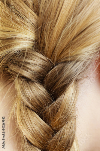 Close up of woman blonde braid hair hairstyle