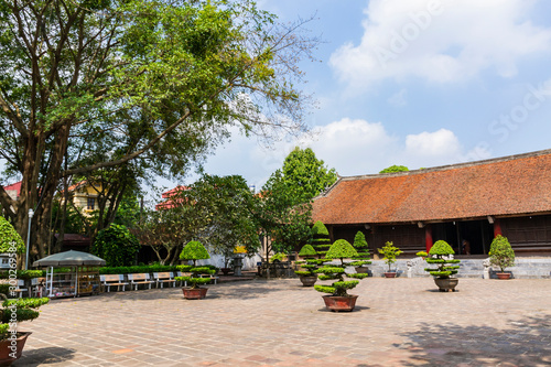 Beautiful scenery of Co Loa communal temple  in ancient Co Loa citadel, Vietnam. Co Loa was capital of Au Lac (old Vietnam), the country was founded by Thuc Phan (An Duong Vuong) about 2nd century BC. photo