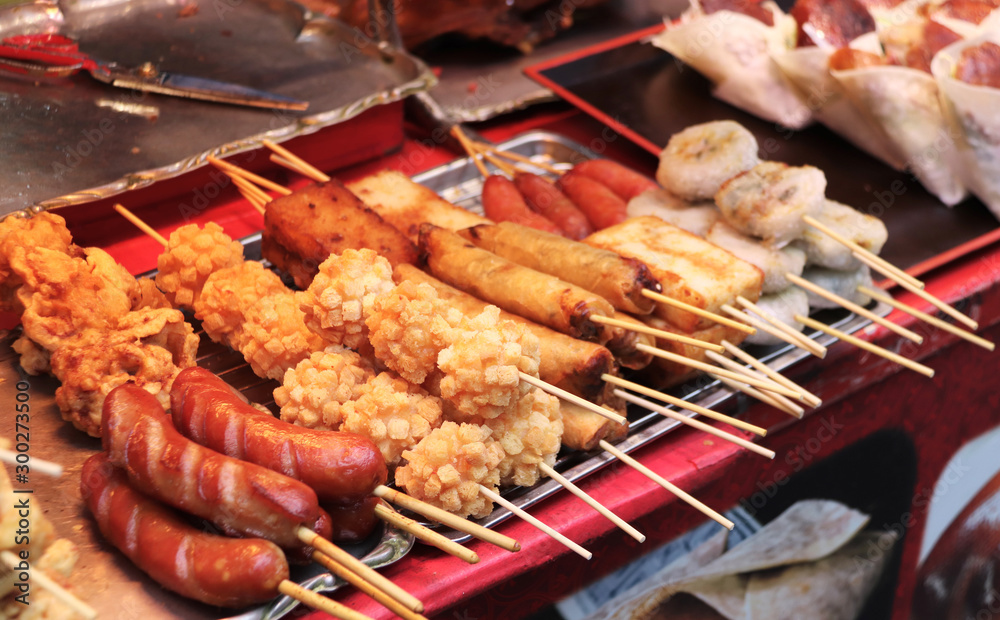Traditional Chinese street food on sticks