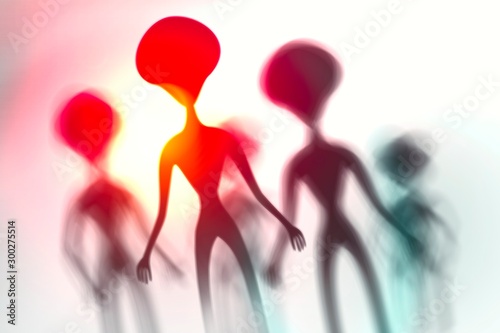 Foto Silhouettes of spooky aliens and bright light on behind them