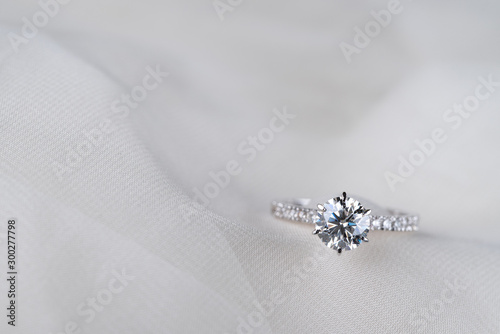 Engagement Diamond Ring on Wedding Dress