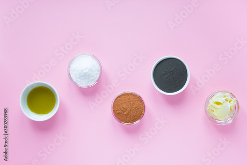 spa set products for self-care at home on pink background. flat lay