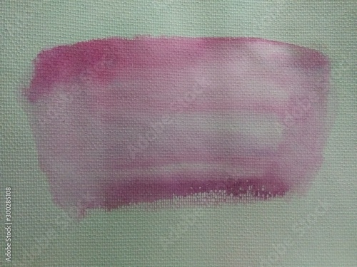 Abstract purple and pink watercolor splashing on white Honeycomb surface paper background; Watercolor hand drawn painting.