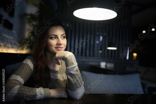 Beautiful girl in a cafe