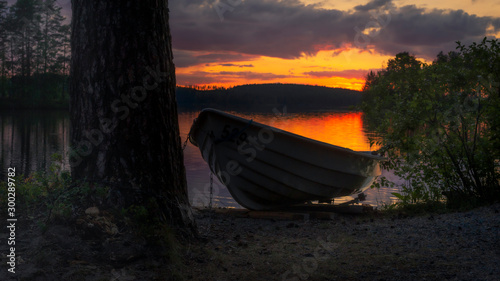 Lake at sunset with reflection in Finland