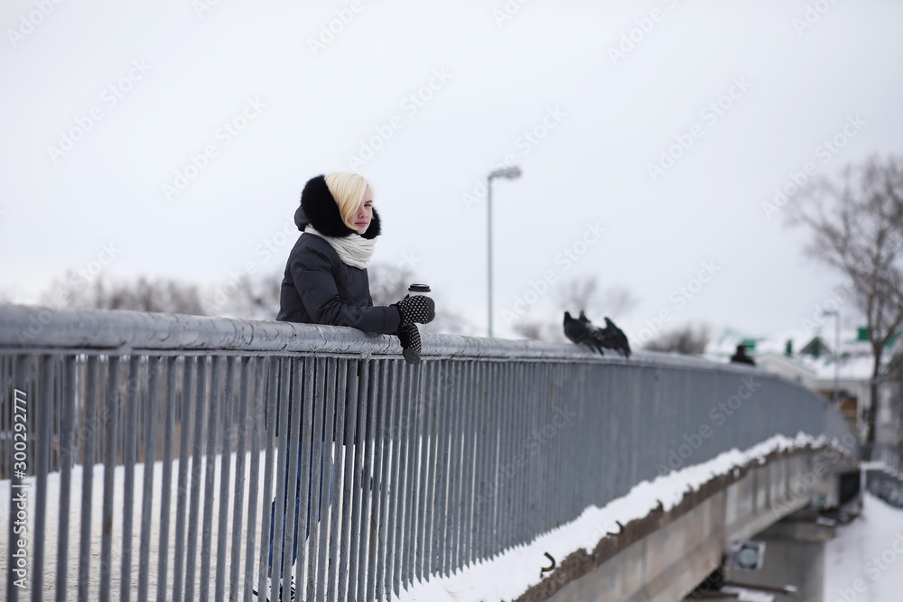 Young beautiful girls on a walk in winter Young beautiful girls on a walk in winter