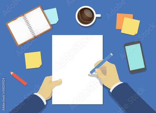 Businesman hands whriting on empty blank paper. The process of business financial planing.