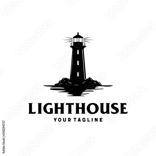 Lighthouse by the sea with ocean water