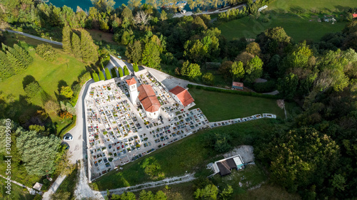 Church and Cemetery at Most na Soci in Slovenia. Aerial Drone View