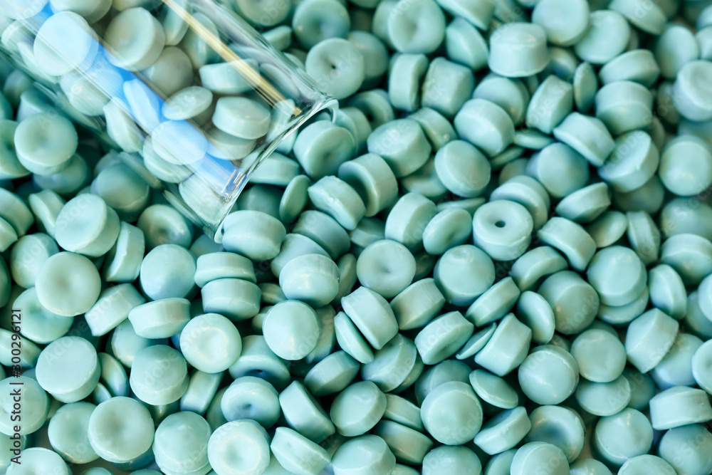 Close up of high-density polyethylene (HDPE) granules, selective focus. Close up of high-density polyethylene (HDPE) granules, selective focus.