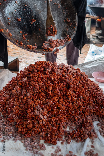 Dialium indum linn in LEGUMINOSAE Dry and fresh , Peeled and dried in the sun to dry and then processed at Pattani, Thailand photo