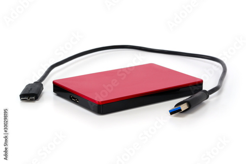 External hard drive disc with usb 3.0 cable. Best way of data storage on portable hdd. Close-up isolated on white surface.