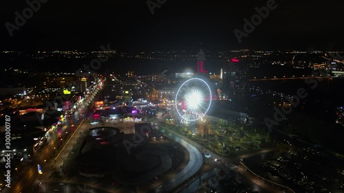 Niagara Falls Ontario Aerial v24 Nighttime panning cityscape view to birdseye with Fall views - October 2017