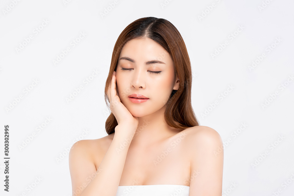 Healthy skin woman gently touching face with hand for beauty concept Healthy skin woman gently touching face with hand for beauty concept