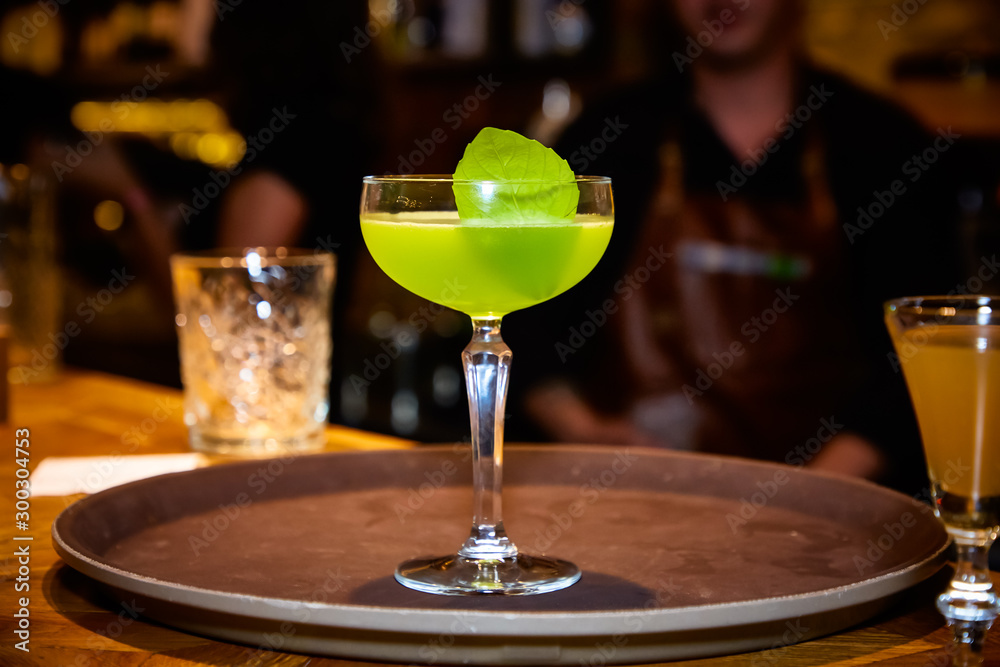 Bright green cocktail, a good idea to celebrate St. Patrick's Day