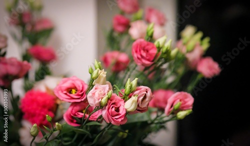Closeup selective focus bouquet pink roses at night