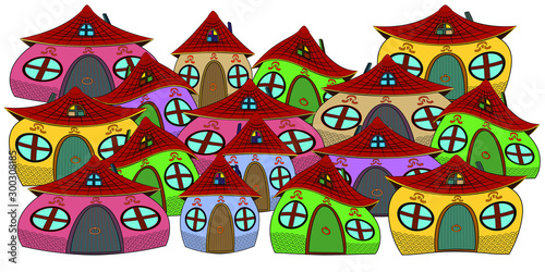 Colorful houses of funny convex shape. A row of houses with round windows, a wooden door and dark red tiles. Dwellings from a fairy tale are convex.