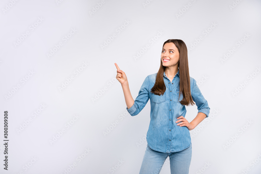 Portrait of confident cool promoter girl point index finger recommend ads  sales discounts give her feedback wear denim jeans clothes isolated over  white color background Stock Photo | Adobe Stock