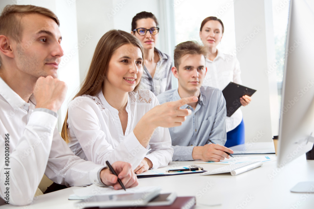Business people working together in the office Business people working together in the office