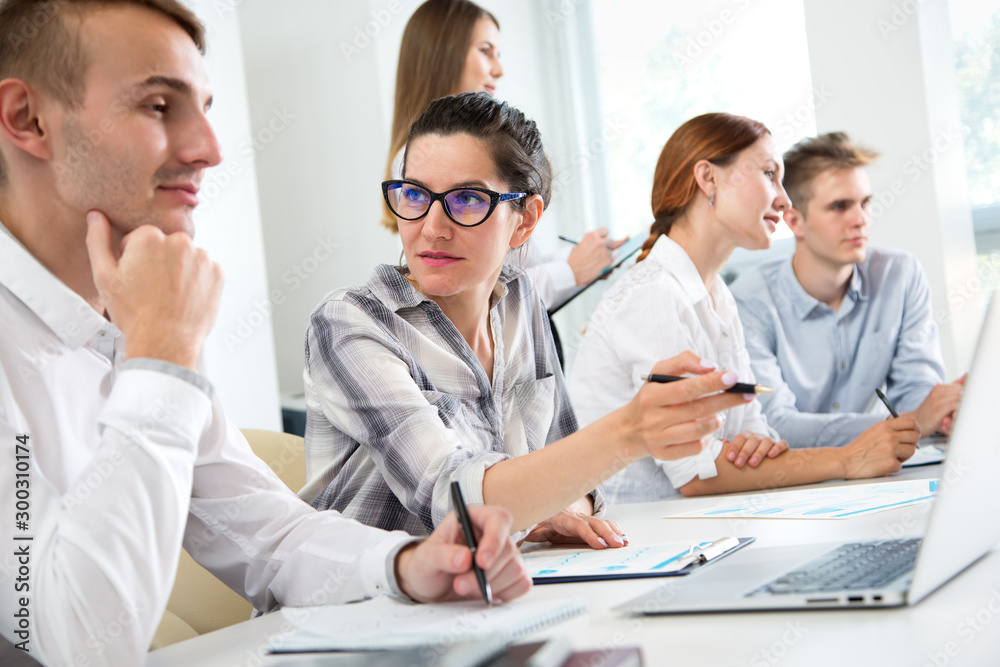 Business people working together in the office Business people working together in the office