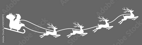 Santa Claus with sled and reindeers