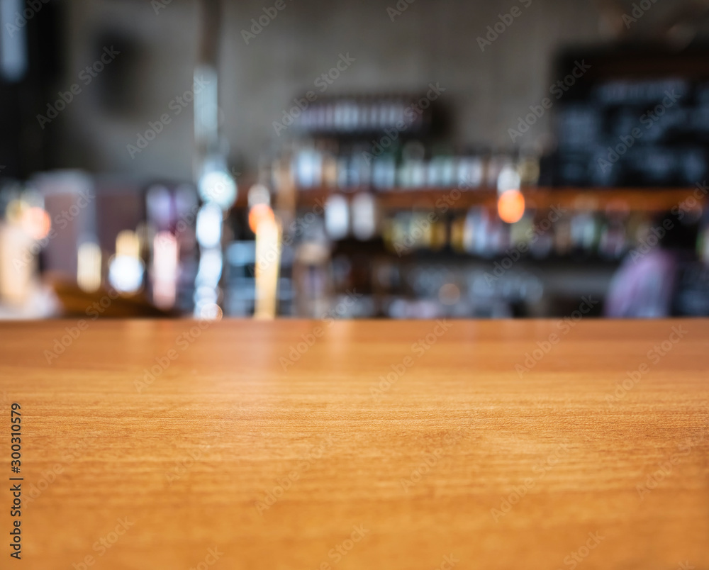 Table top wooden Bar counter Beer tab restaurant Blur background