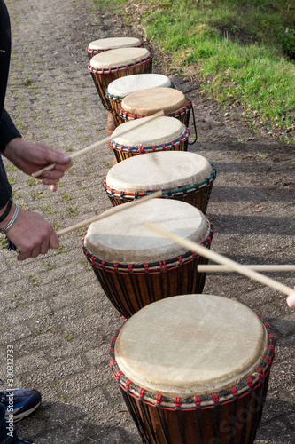 Playing drum. Music. Djembe. Rythym photo