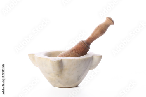 marble mortar and wooden peslte isolated on white background with clipping path and copy space for your text photo