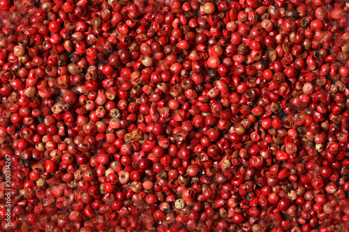 close up on pink pepper grains