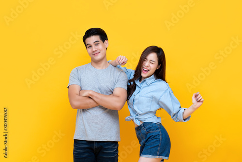 Bilde på lerret Lovely young smiling Asian couple in casual clothes