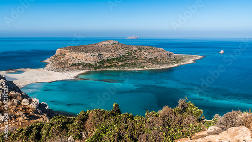 An island with a sandbar in the Mediterranean sea