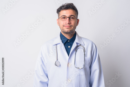 Portrait of young Persian man doctor with eyeglasses © Ranta Images