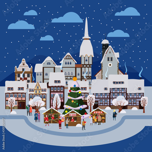 Christmas urban night winter city street with old town houses and trees