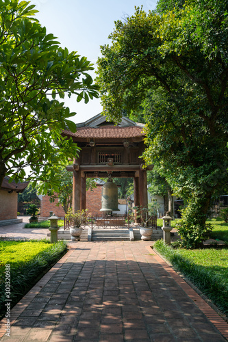 Square building holding a big bell on side of Imperial Academy in Temple of Literature (Van Mieu), the first national university in Hanoi