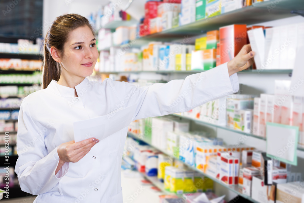 Woman pharmacist working in pharmacy