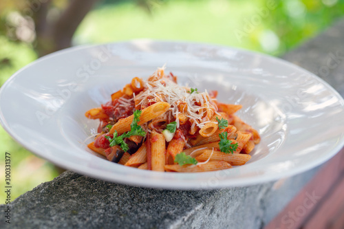 Tasty Italian pasta with tomato