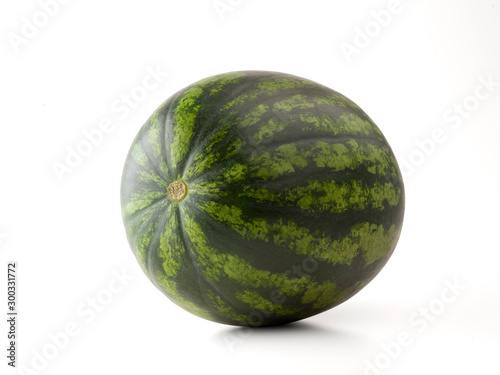 Striped watermelon isolated on white background