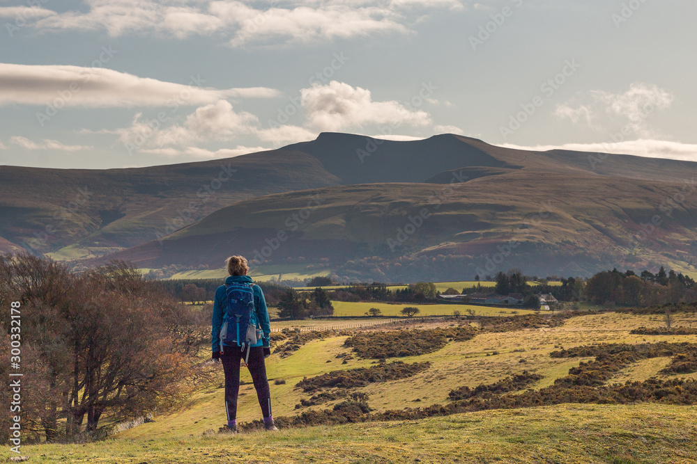 Looking at the view of the Brecon Beacons National park while hiking. November 2019.
