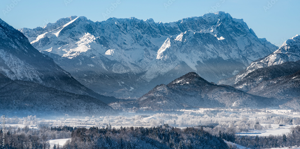 panoramic scene in Bavarian mountains at winter