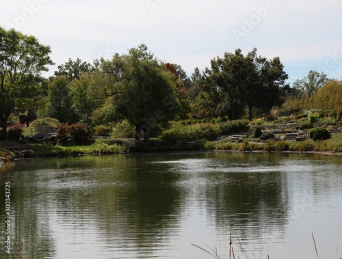 A view of the pond and the garden area of the park.