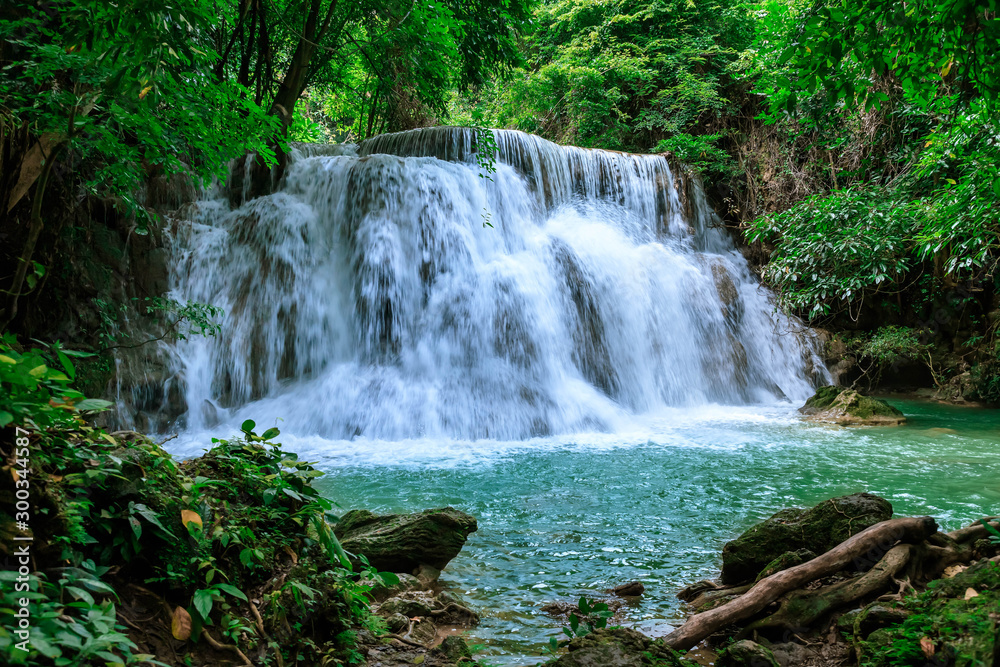 Fototapeta premium Huai Mae Khamin Waterfall level 3, Khuean Srinagarindra National Park, Kanchanaburi, Thailand; high shutter speed, freeze, no motion